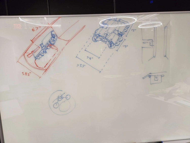 Whiteboard sketch of modified helical-wheeled rover positioned inside Gladius II.