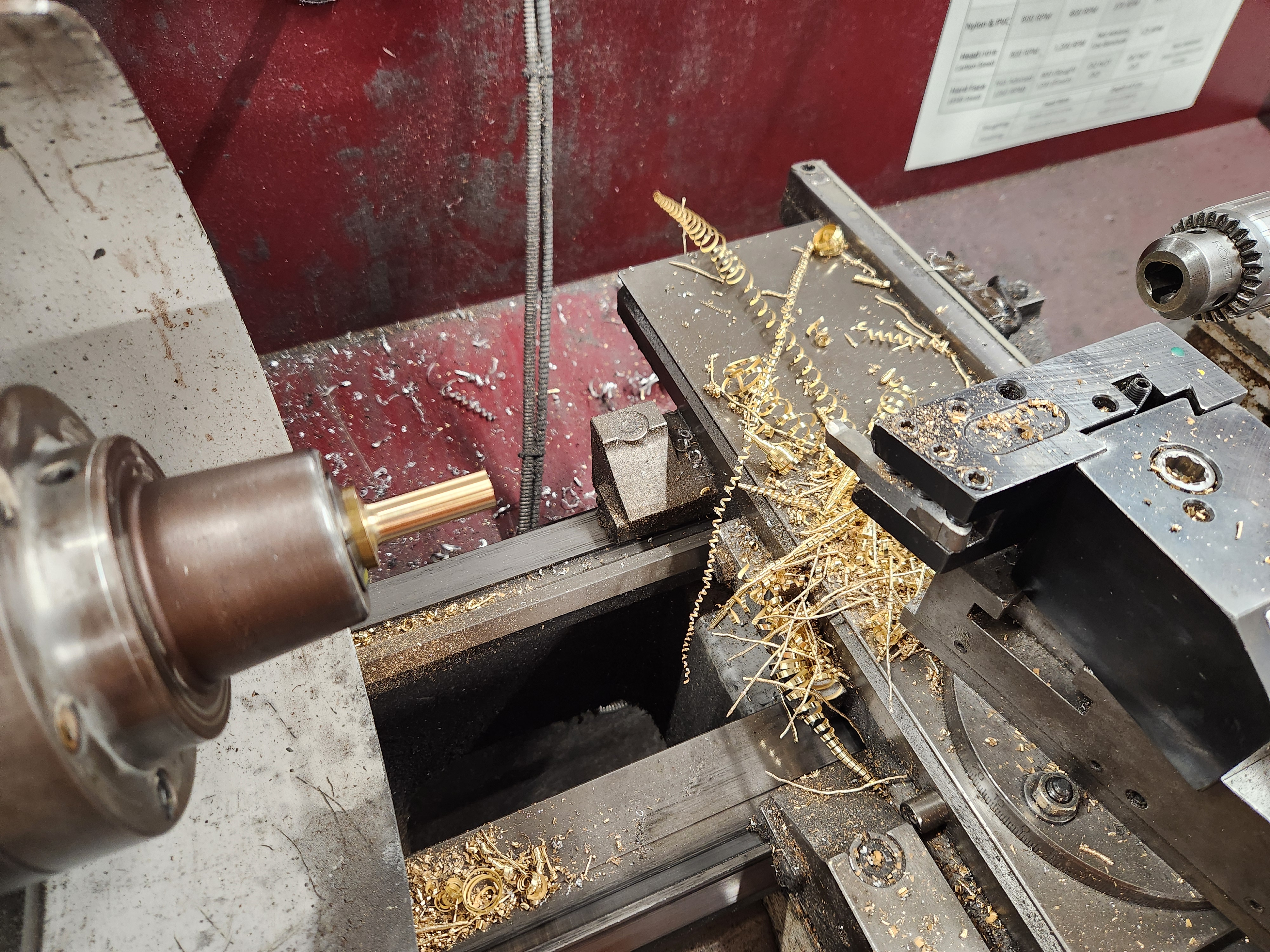 Photo of reducing brass fidget toy diameter via lathe.